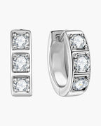 Pair of women's silver 925 hoop earrings with three sparkling cubic zirconia stones