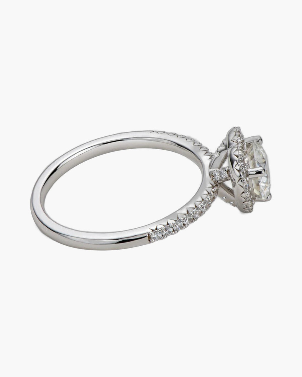 Elegant women's silver 925 ring with a large central diamond and pave band
