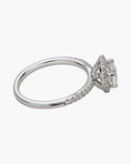 Elegant women's silver 925 ring with a large central diamond and pave band