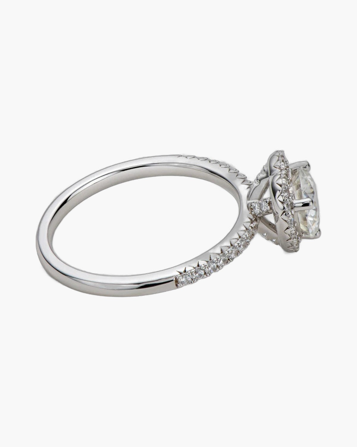 Elegant women's silver 925 ring with a large central diamond and pave band