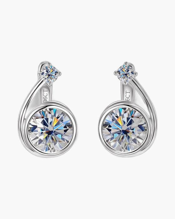 Women's sterling silver asymmetrical spiral clip hoop earrings with brilliant round moissanite stones