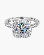 Sparkling women's silver 925 ring with a large round diamond and halo setting