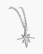 Women's silver 925 necklace with a star-shaped pendant featuring a sparkling clear stone