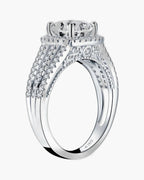 Sparkling women's silver 925 ring with a large central gem and pavé side stones