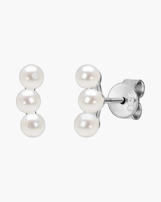 Elegant women's silver 925 stud earrings featuring three delicate white pearls in a row