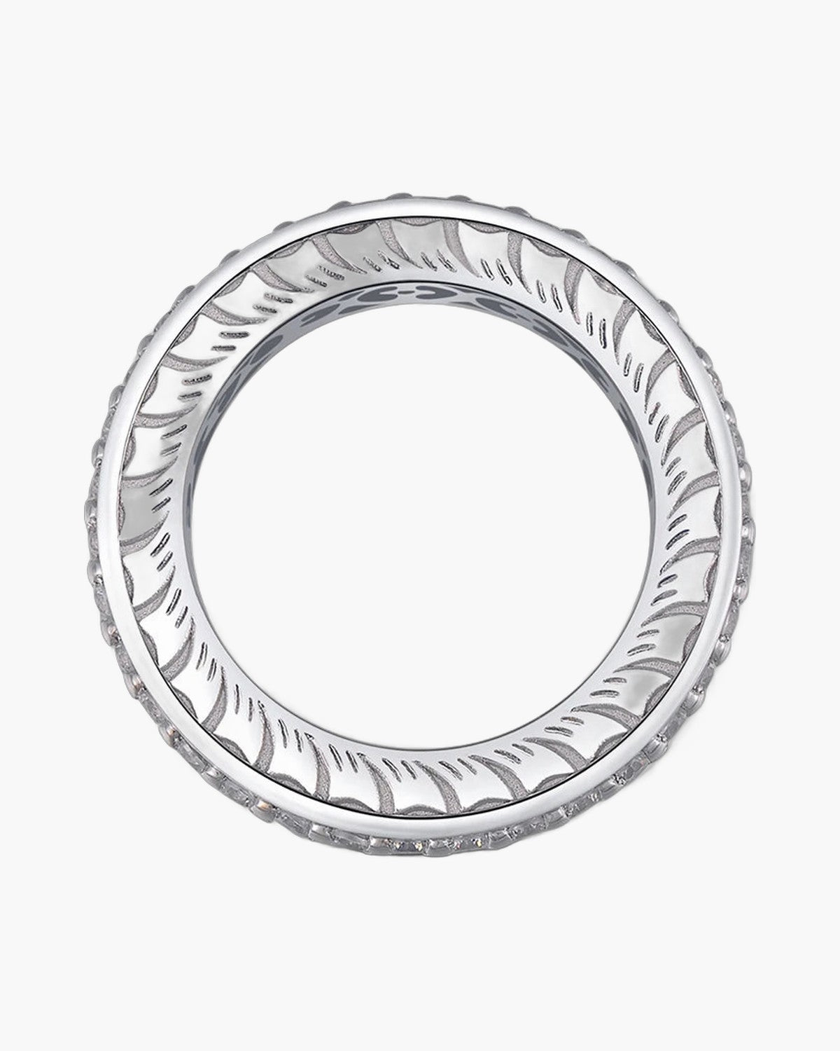 Women's sterling silver ring with intricate engraved pattern and sparkling pave stones