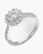 Sparkling women's silver 925 ring with a large central diamond and halo setting